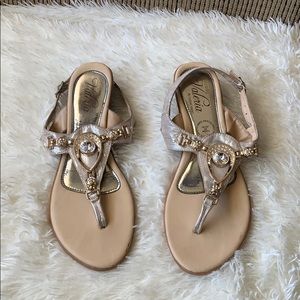 Gold sandals with gems